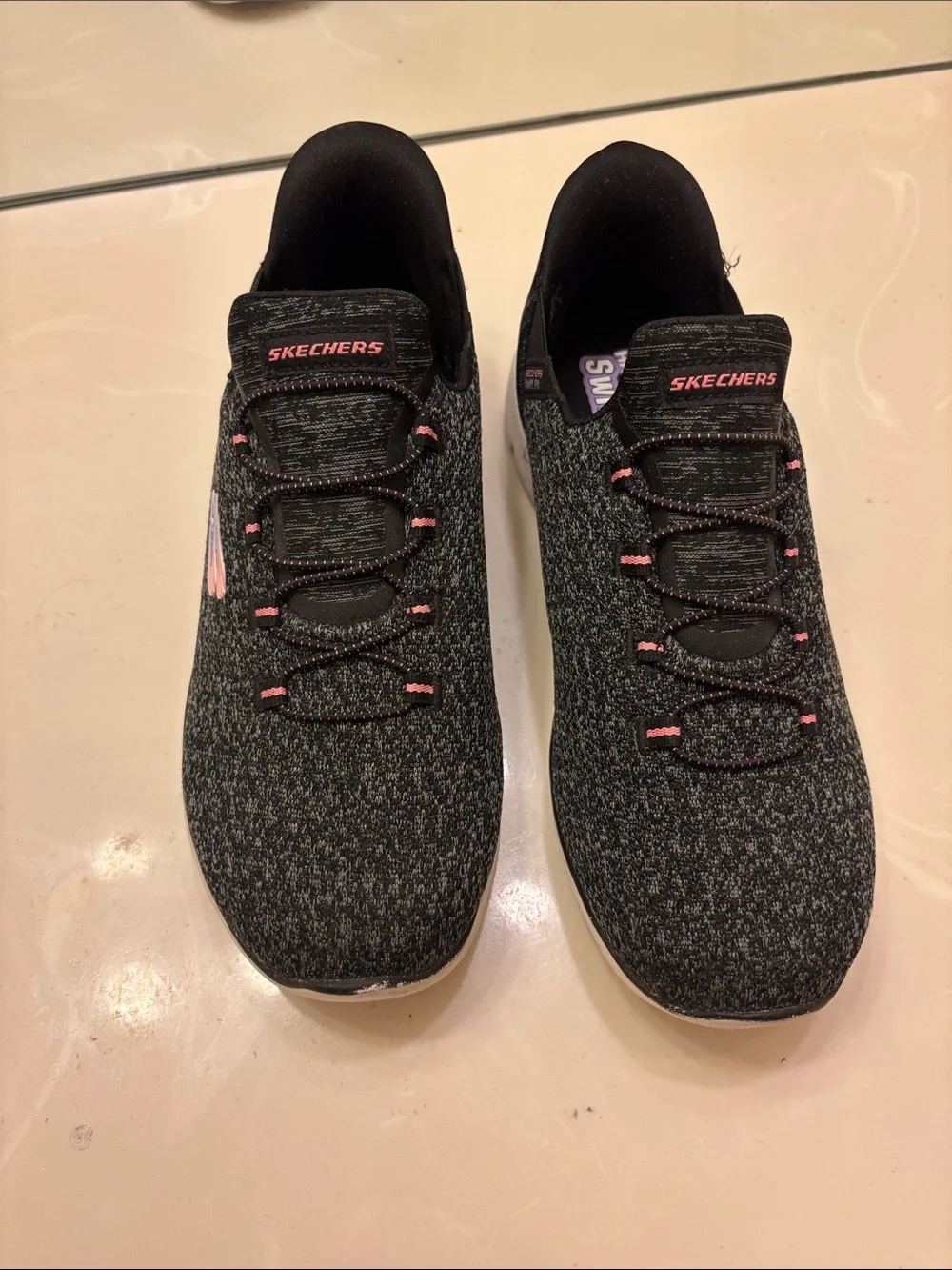 Skechers Men's Black Knit Slip-On Sneakers with Pink Highlights